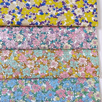 幅145cmのカラフルな枝の花柄プリントコットン生地