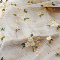130cm幅の枝の花の庭による刺繍のレースの生地